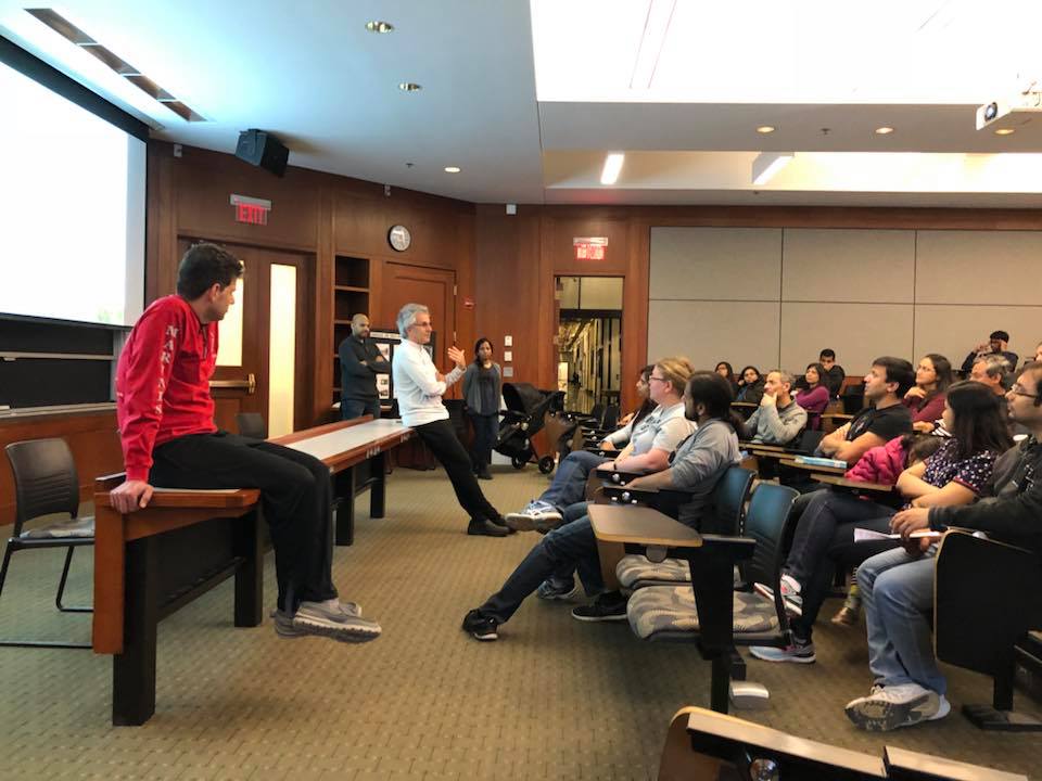 Coach briefing the team indoors