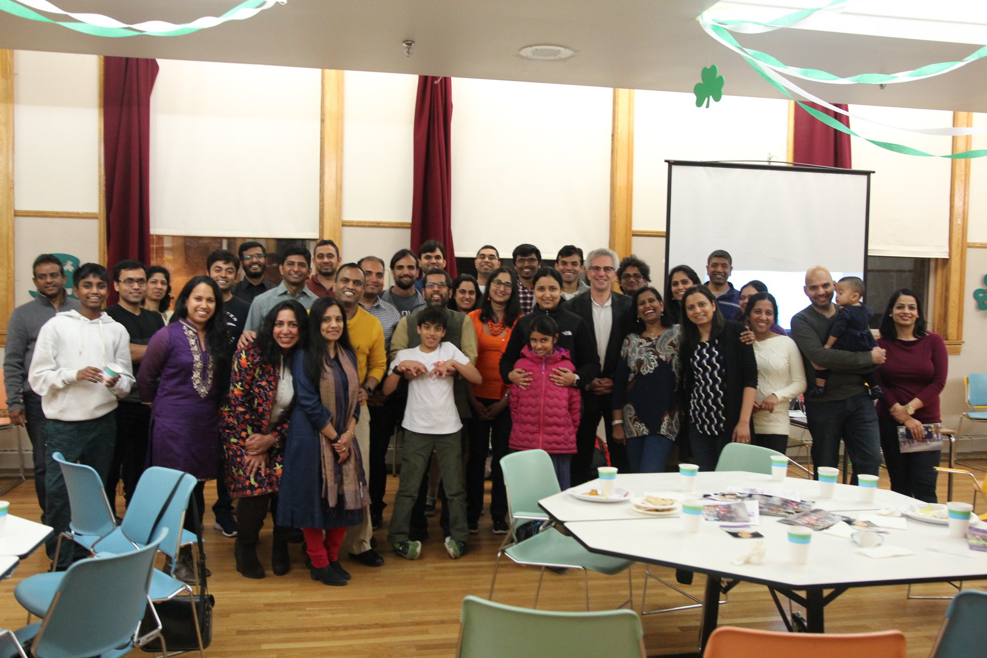 Supporters holding Good Job Everyone and Great Runner signs