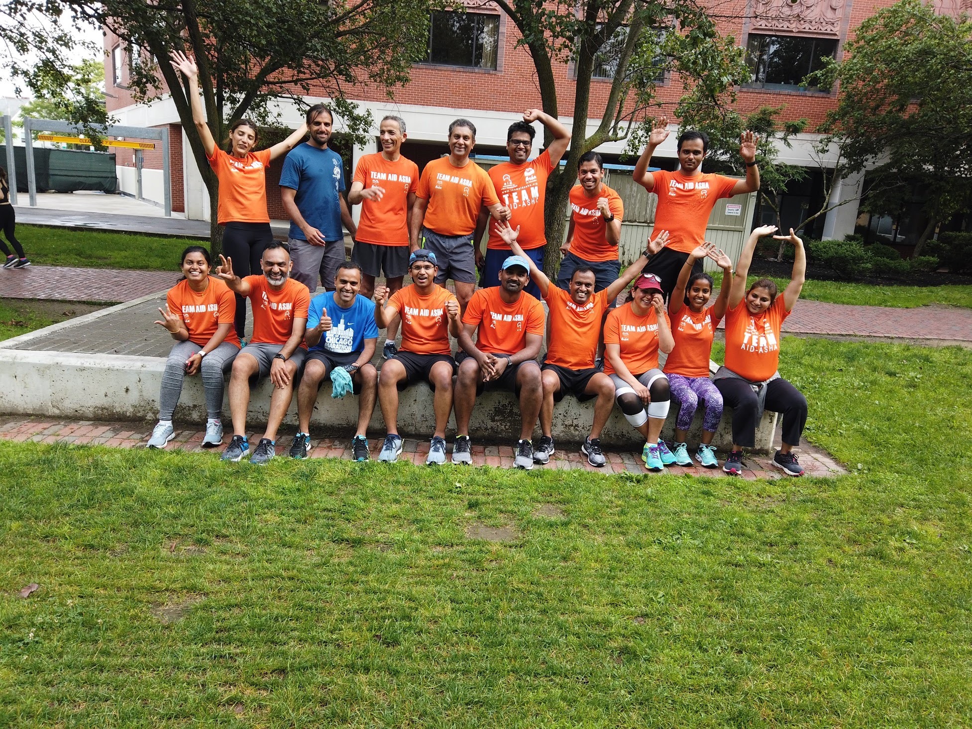 Team floor stretches in park