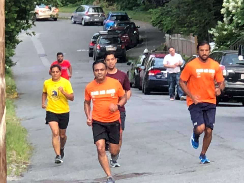 Water station volunteer on porch